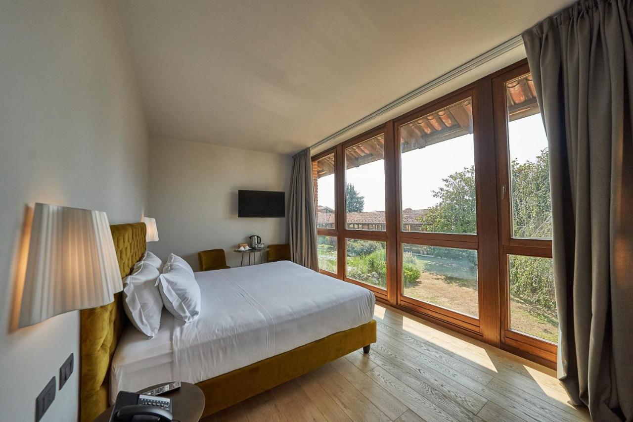 Отель Relais Cascina Era Сандильяно Экстерьер фото