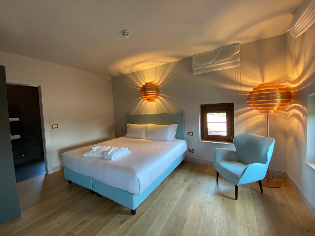 Отель Relais Cascina Era Сандильяно Экстерьер фото